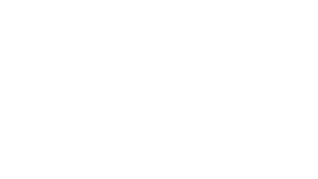Håndværkere arbejder på et træprojekt i et værksted, fokus på kvalitet og håndværk.