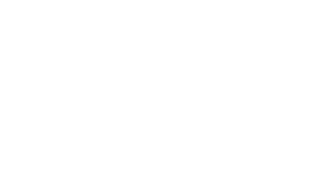 Håndværkere arbejder på et byggeprojekt med træ- og tømrerarbejde.